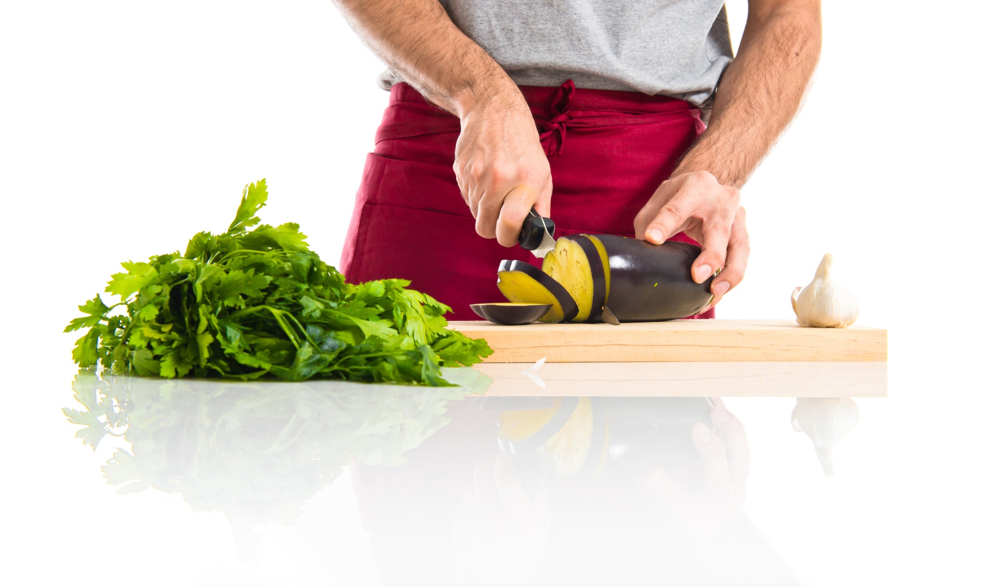 Close-up of fresh herbs being chopped